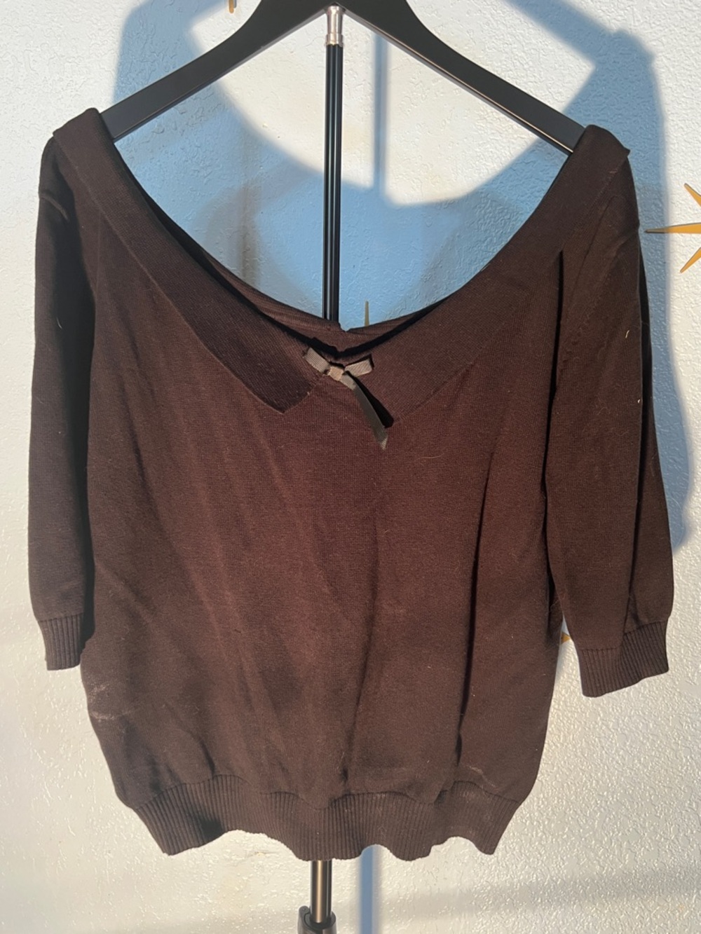 Collectif Black Women's V-Neck Sweater with Bow Detail